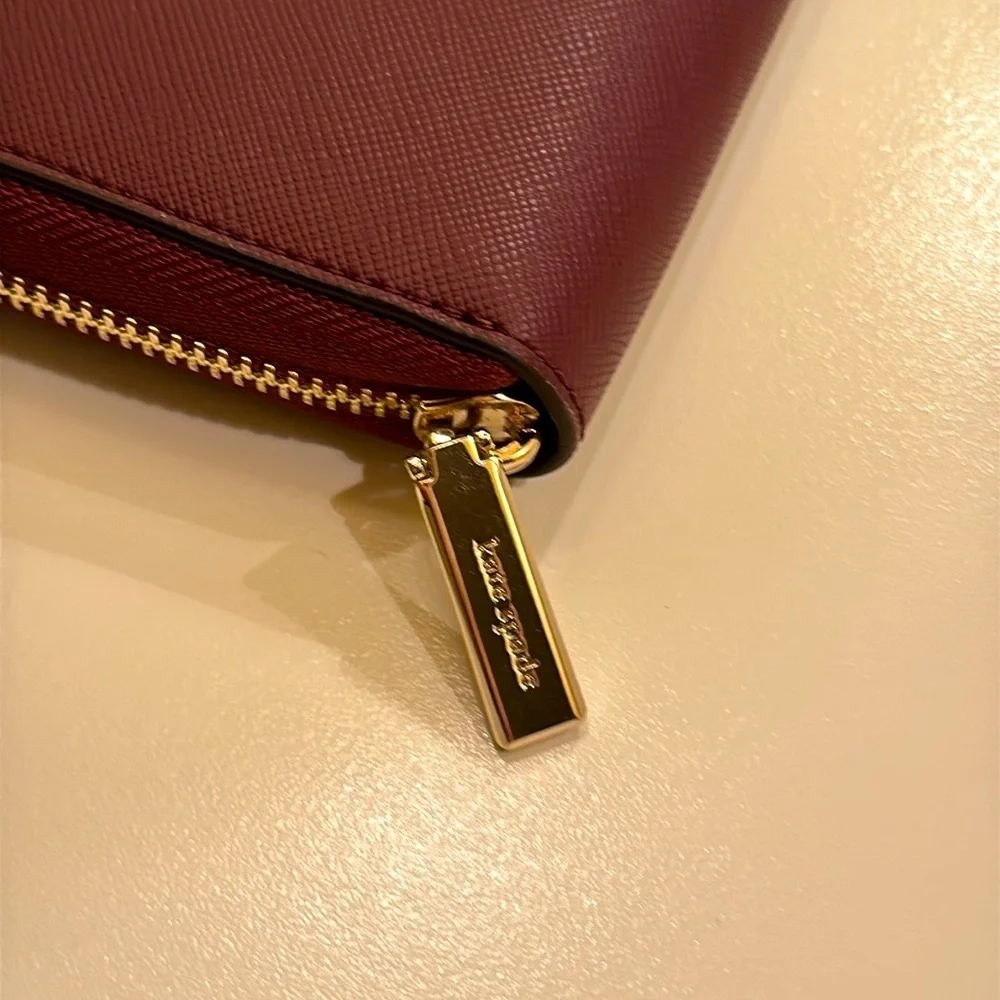 New KATE SPADE Leather Wallet. Gold Zipper And Engraved Logo. Burgundy.
